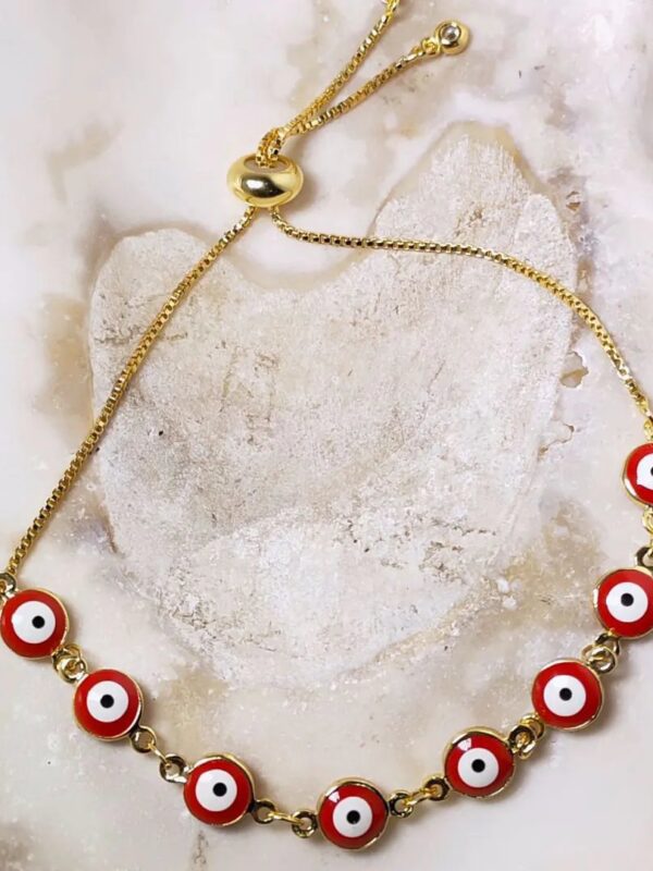 2024/12/1001542509.jpg pulsera ojo turco regulable acero dorado