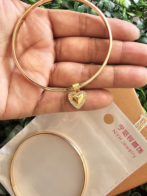 puñera 5.7cm  delgada para poner dijes NYH jewerly rose ACERO