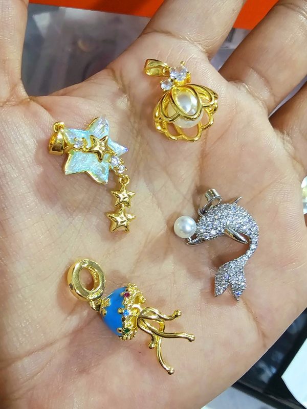 dijes de mar marinos delfin acero dorado