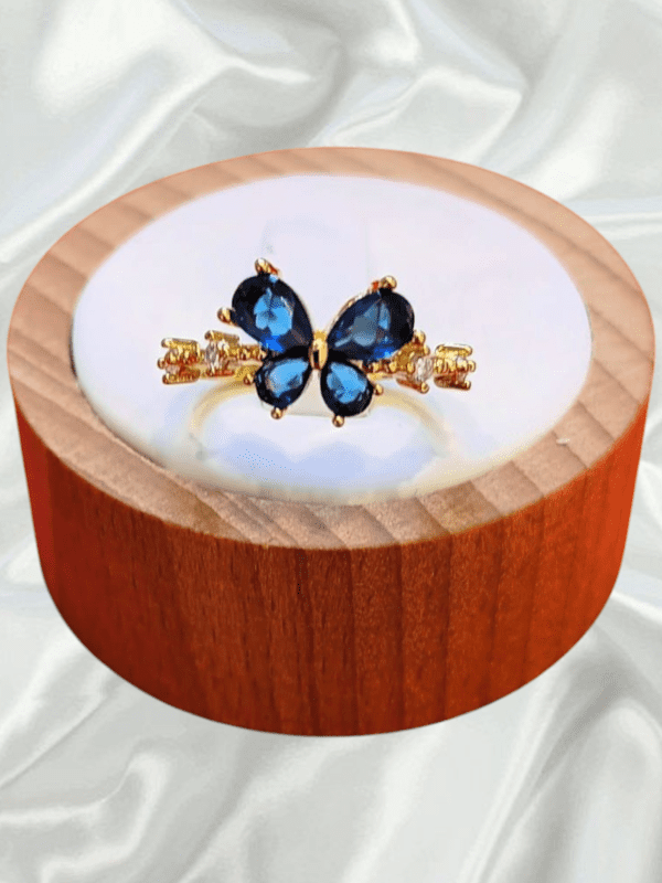 anillo mariposa azul acero dorado regulable