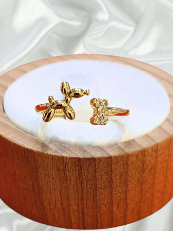 anillo perro globo hueso acero dorado regulable