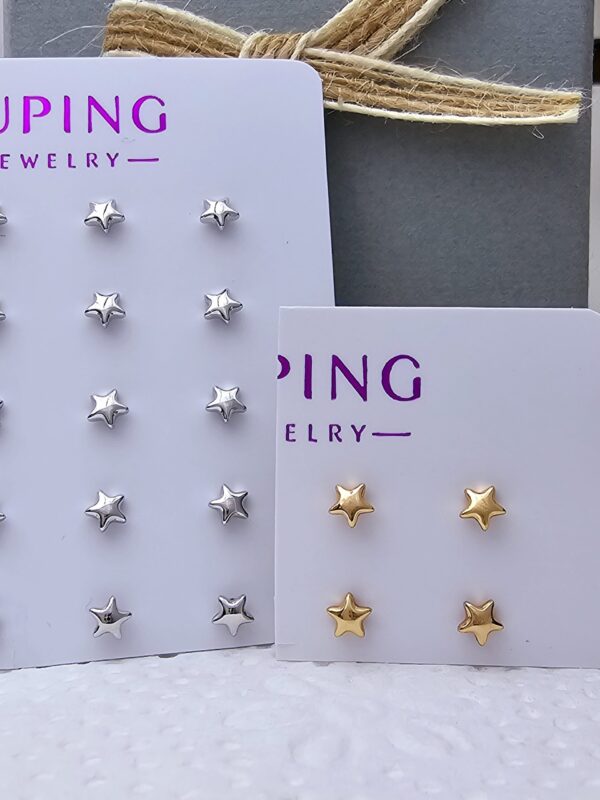 aretes estrella lisas xuping jewerly rose y plateado