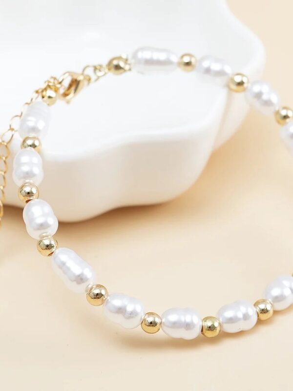 pulsera perlas de rio naturales acero dorado y plateado