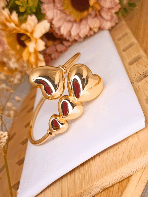 puñera regulable corazon acero dorado y plateado