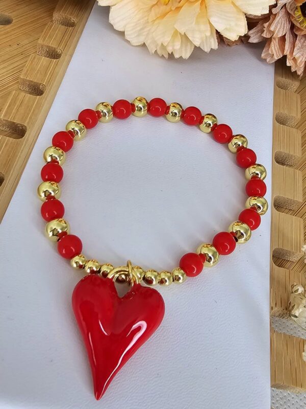2025/06/IMG-20250530-WA0142-scaled.jpg pulsera billas corazon rojo dorado
