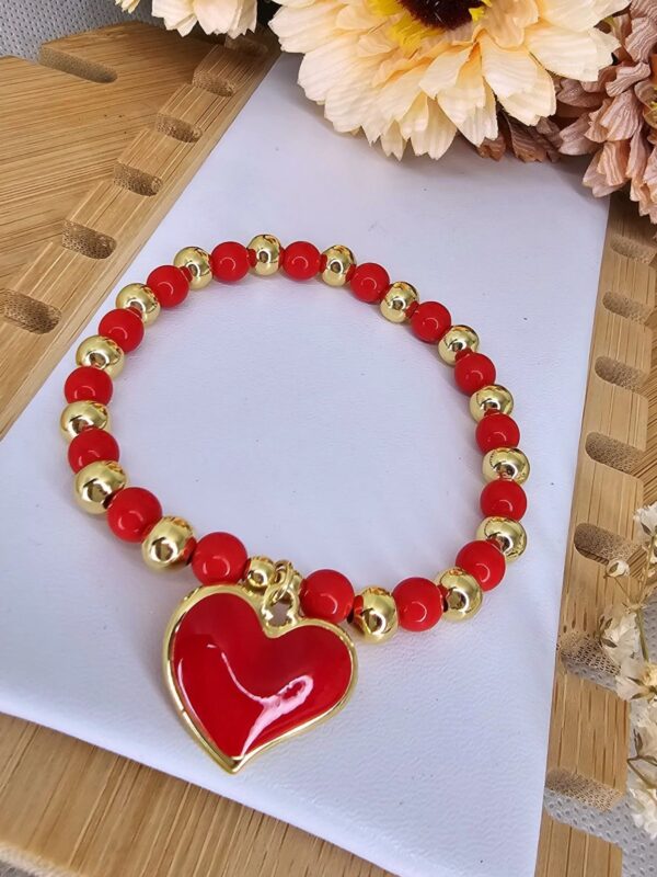 2025/06/IMG-20250530-WA0144-scaled.jpg pulsera billas corazon rojo dorado