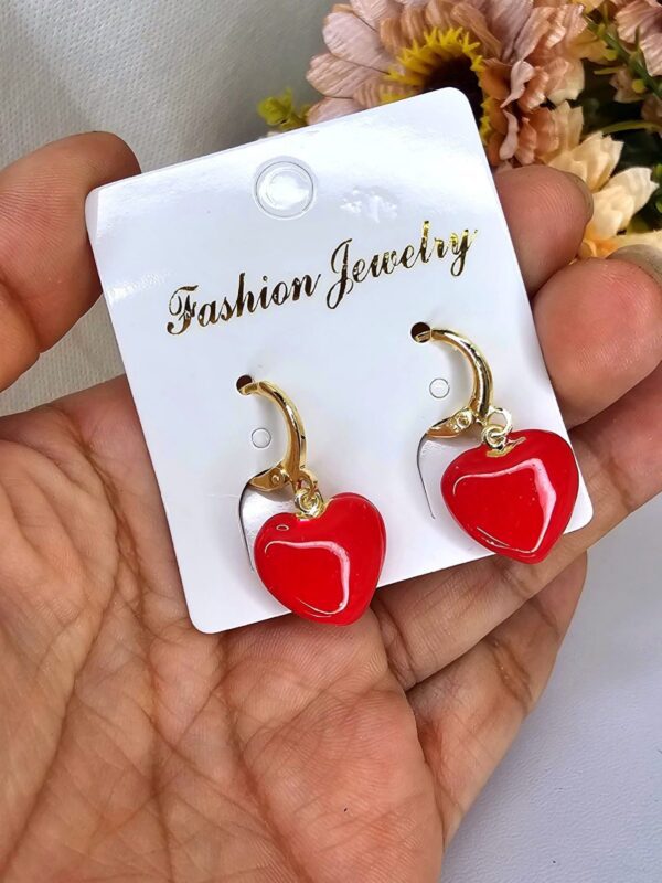 arete corazon rojo acero dorado