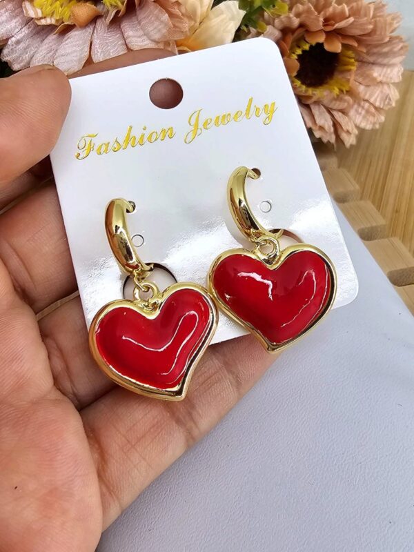 arete corazon rojo acero dorado