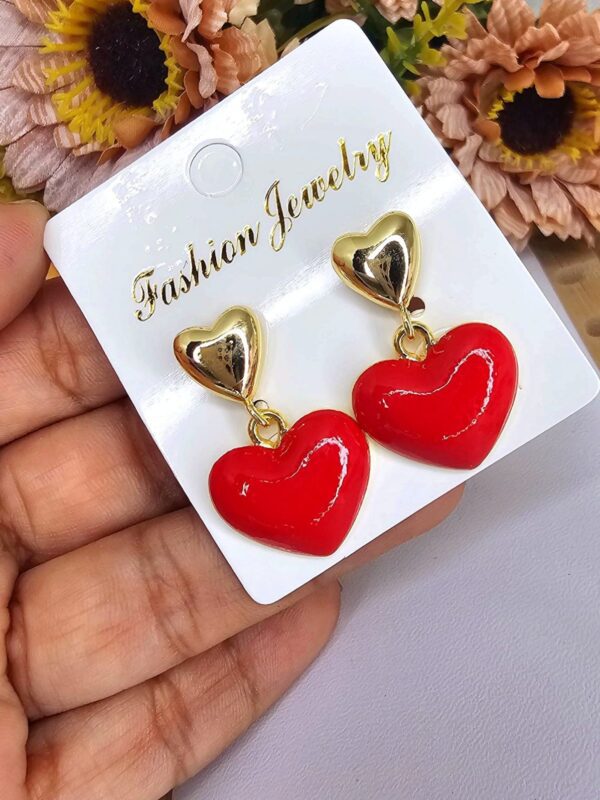 arete corazon rojo acero dorado