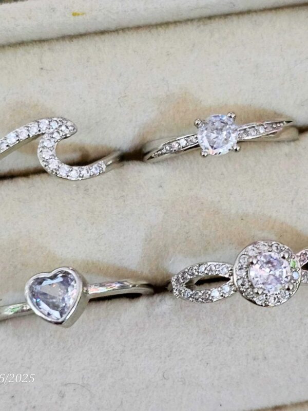 anillo puntos de luz, ola, corazon regulable acero plateado