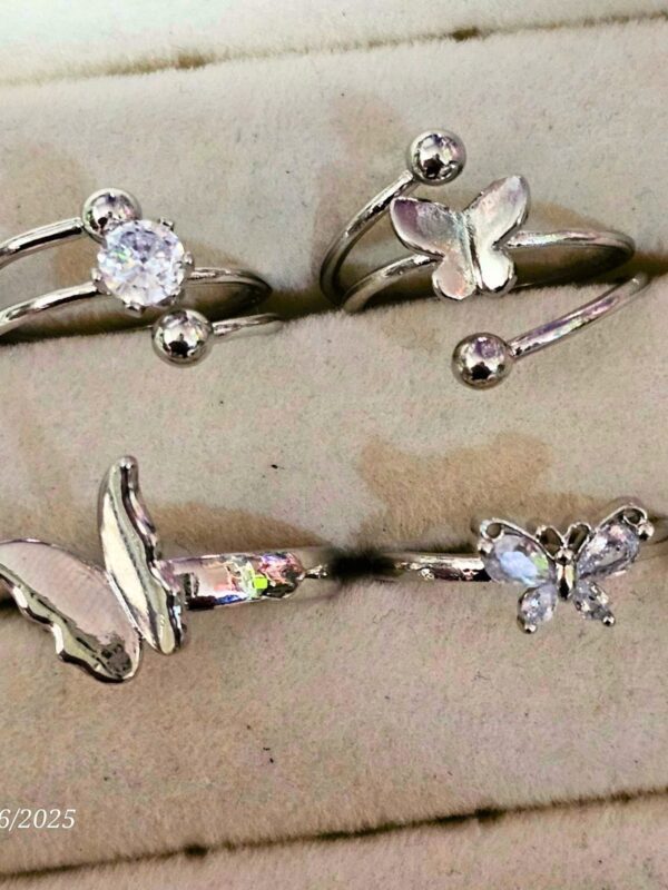 anillo mariposas regulable acero plateado
