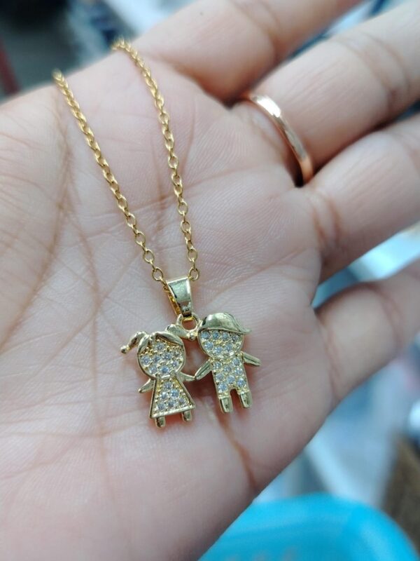 dije niño niña dorado acero