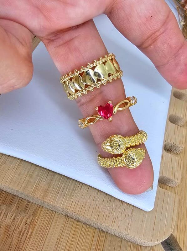 anillo regulable acero dorado en corazon, serpiente