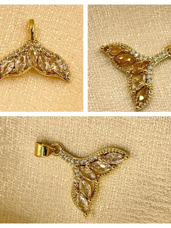 2025/08/1001525562-scaled.jpg Dije cola de sirena 🧜♀️ plateado