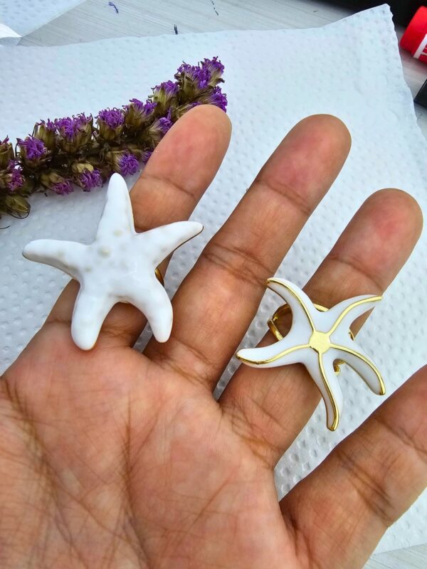 Anillo estrella de mar acero dorado regulable