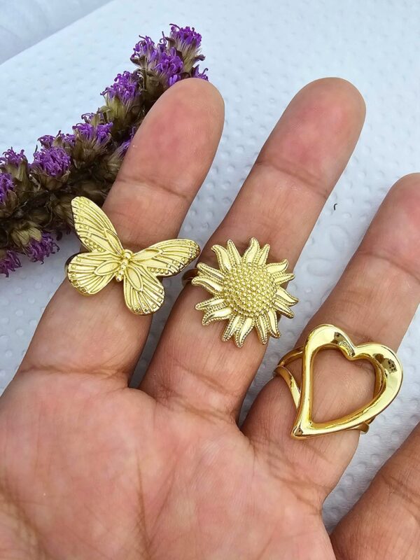 Anillo chunky corazon mariposa girasol acero dorado regulable