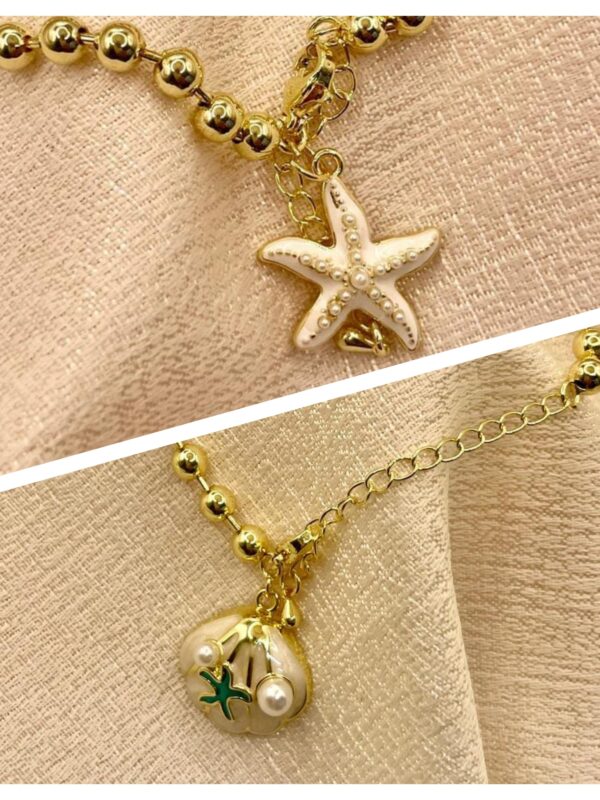 2025/08/1001540542-scaled.jpg pulsera marinas billas estrella de mar, conchas dorado, con extensión