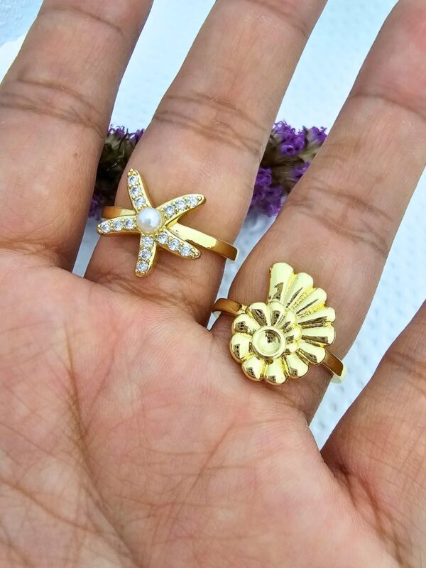 anillos caracol, estrella perlas acero dorado regulable