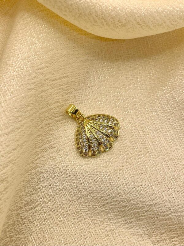 2025/08/IMG-20250819-WA0018.jpg Dije Concha de mar dorado