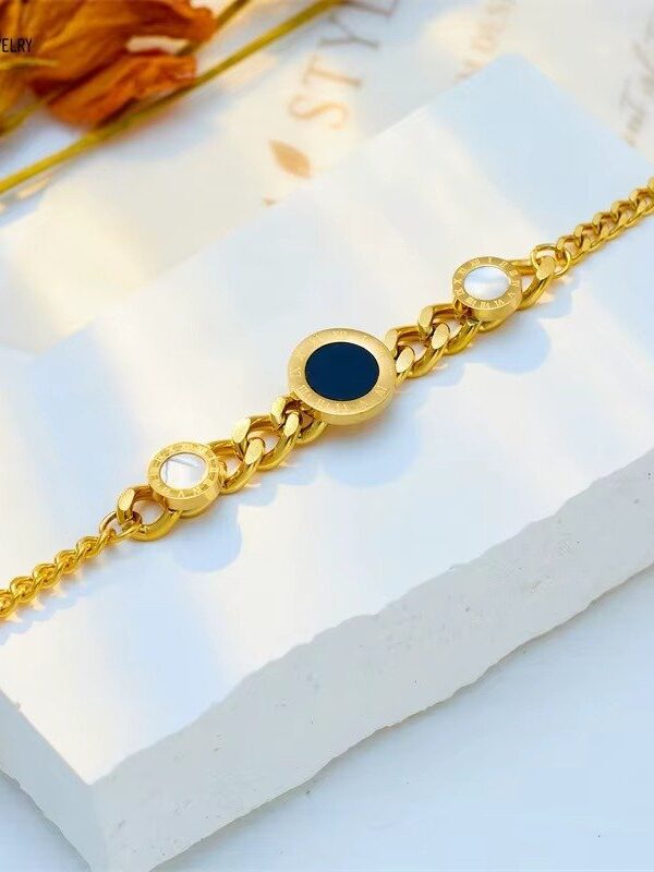 pulsera réplica marca acero 316 dorado