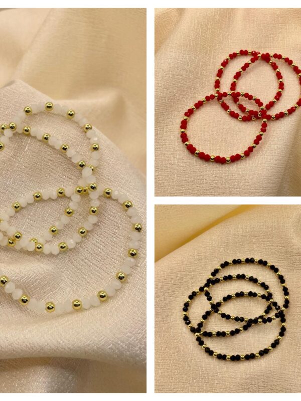 2025/09/1001612899-1-scaled.jpg Juego de 3 pulseras blanco,rojo, negro, murano dorado