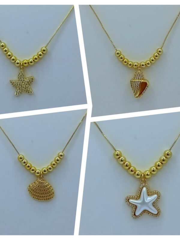 2025/09/1001612953-scaled.jpg collar marino estrella concha de mar, corazon dorado