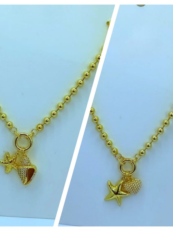 2025/09/1001612956-scaled.jpg collar marino estrella de mar , corazon dorado