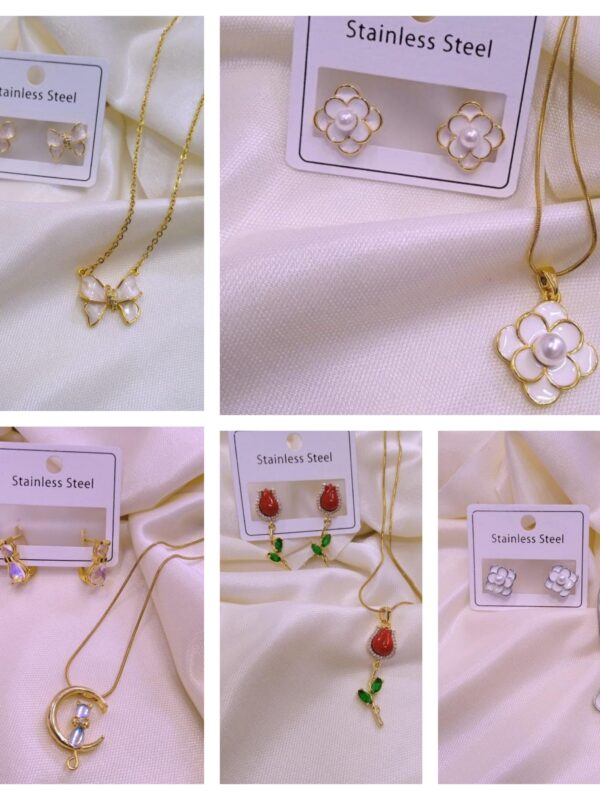 2025/09/1001613616-scaled.jpg set flores, gato luna, lazo blanca acero dorado y plateado