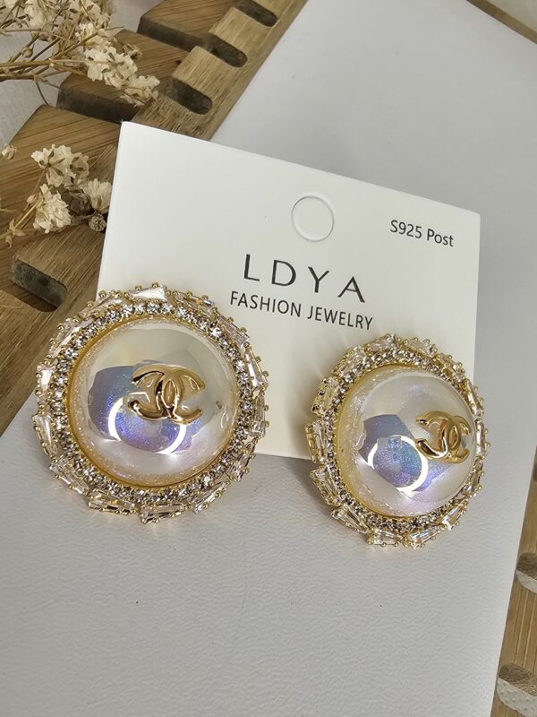 arete perla tornasol chunky marca réplica acero 316 dorado