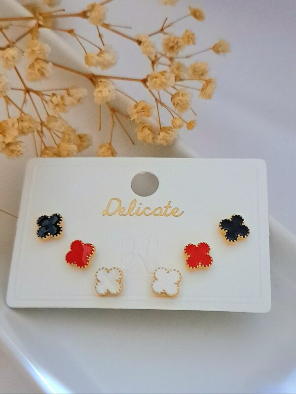 2025/09/1001658385-scaled.jpg juego aretes tipo van cleef NYH delicate acero dorado