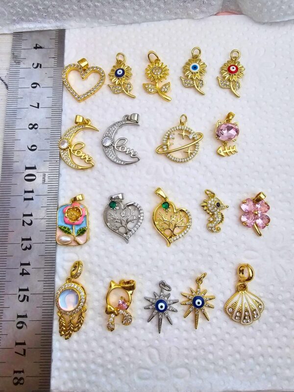 dijes para collar o pulsera acero dorado y plateado. modelos marinos, corazon flores, luna, saturno, gato, flores, atrapasueño estrella