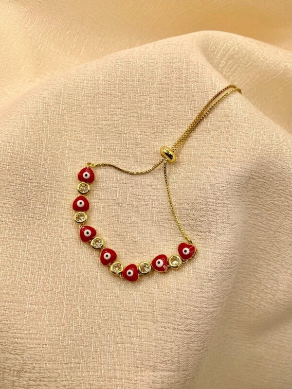 2025/09/IMG-20250814-WA0135.jpg Pulsera ojo turco corazon regulable dorado