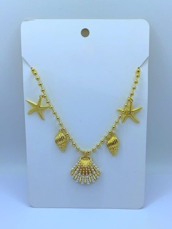 2025/09/IMG-20250815-WA0020.jpg Collar marino conchas estrella billas dorado