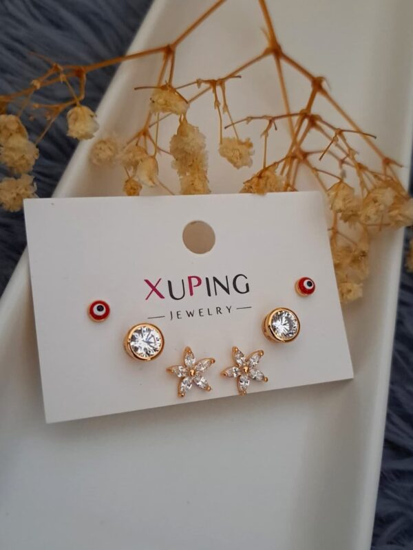 juego aretes flores, ojo turco, punto de luz xuping jewerly rose