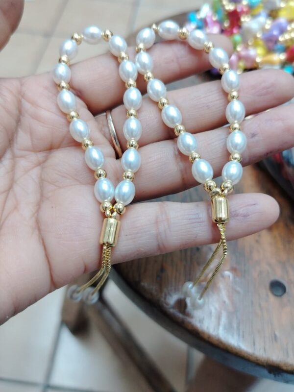 pulsera perlas acero dorado regulable