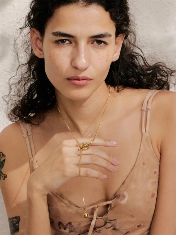 collar broche T, 55cm+10cm doble enchape acero 316* dorado