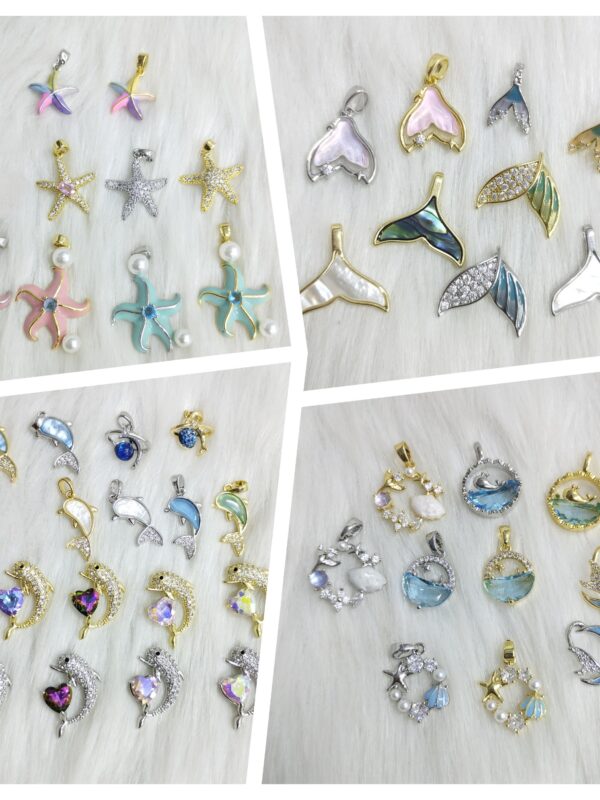 dijes marinos estrella, conchas de más, luna , delfin, colitas de sirena 🧜‍♀️ acero dorado