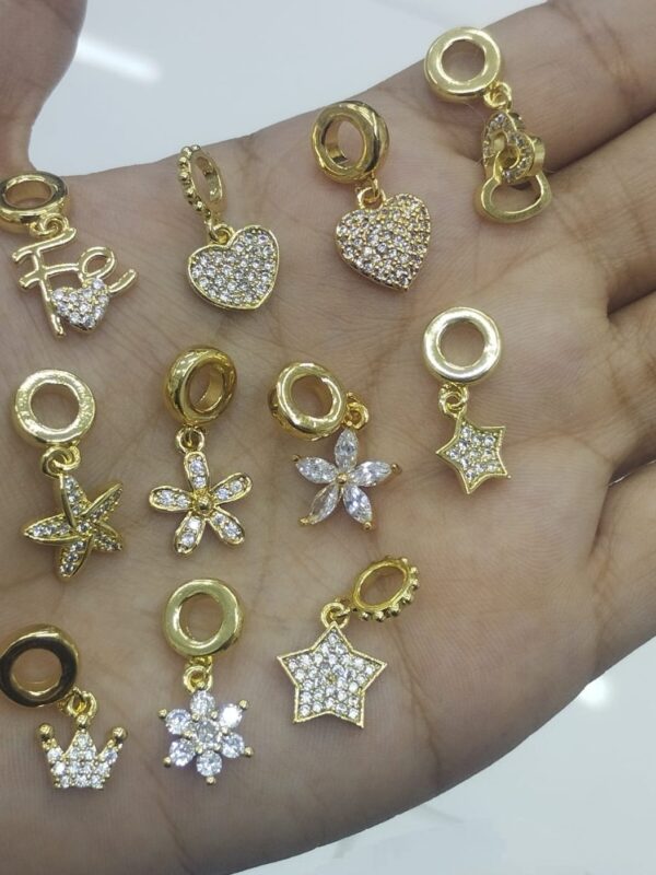 dijes charms acero dorado. para pulseras o collar