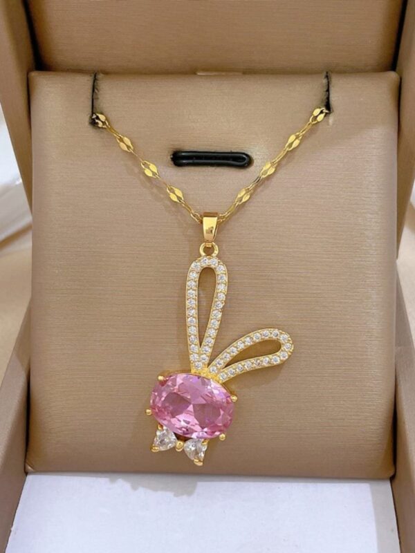 collar conejo acero dorado