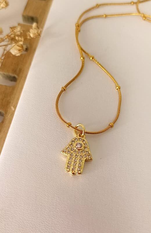 collar mano acero dorado