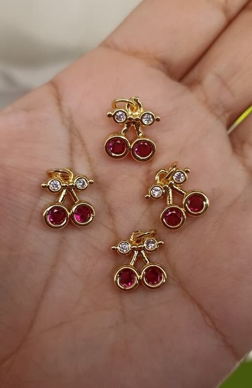 dijes cereza acero dorado