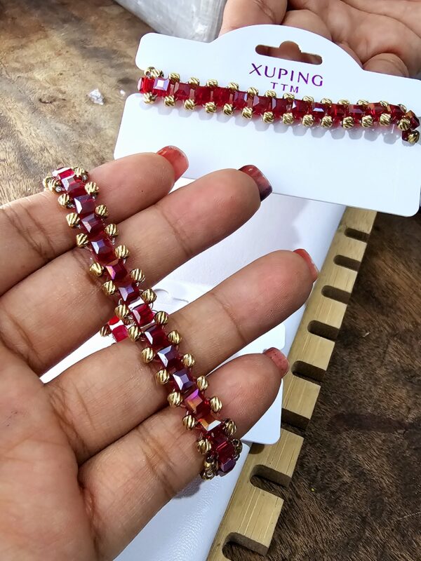 Pulsera de cristales rojos xuping TTM acero inoxidable dorado