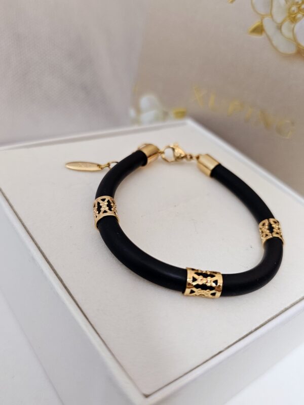pulsera  silicon negro xuping jewerly rose