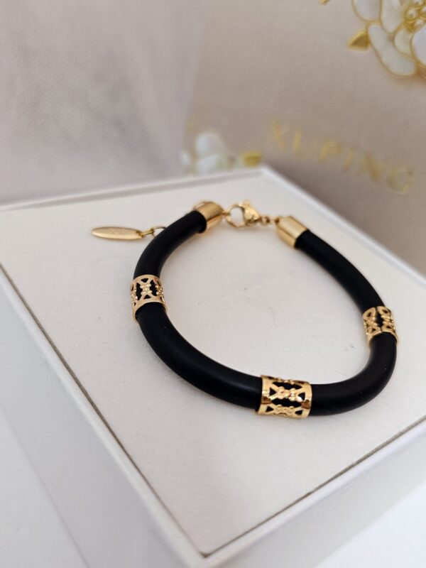 pulsera  silicon negro xuping jewerly rose