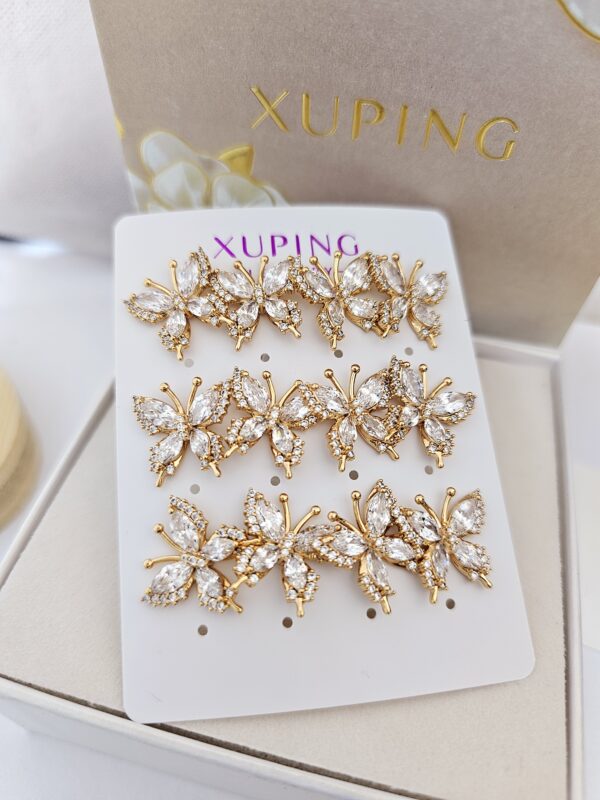 arete mariposa con circon xuping jewerly rose