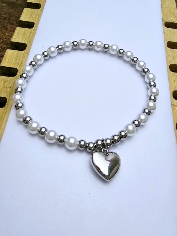 Pulsera perlas billas xuping elástica