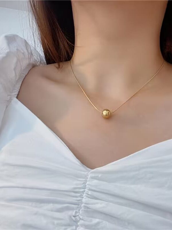 collar billas acero dorado