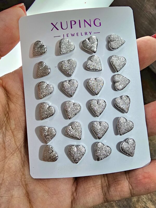 2025/12/20251029_173529-scaled.jpg arete jaspeado corazon xuping jewerly plateado