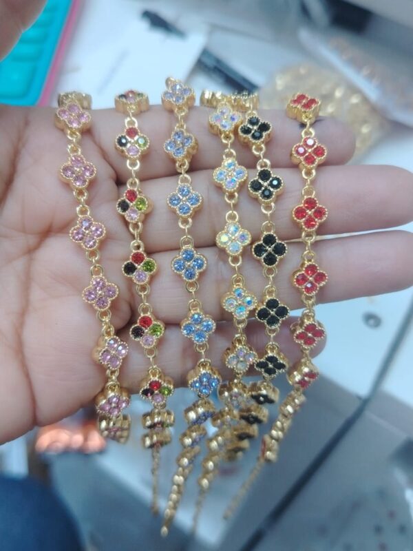 pulsera flores acero dorado