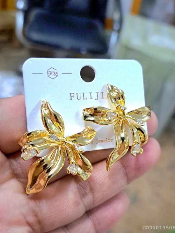 aretes flores chunky acero dorado